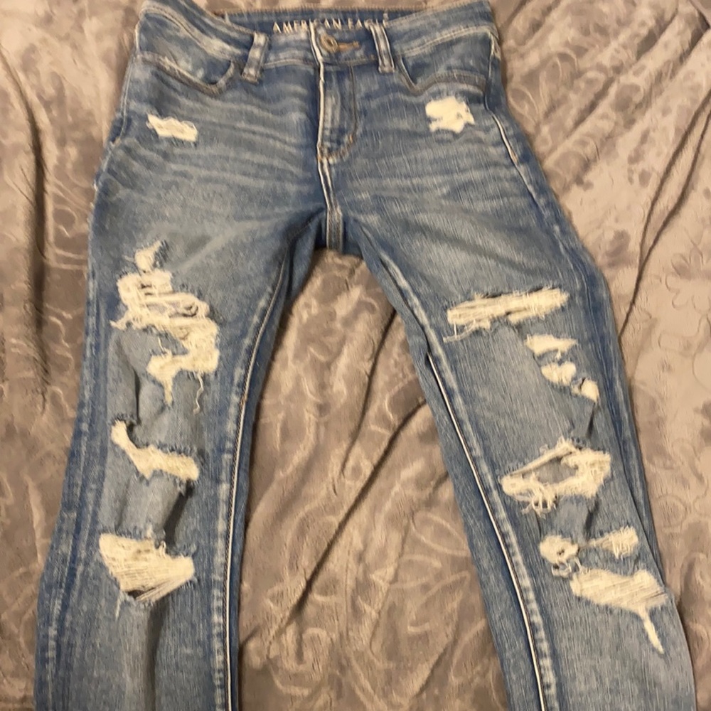 Distressed American Eagle jeans rips in the back